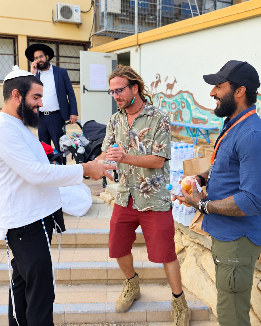 Benjamin Grant handing out supplies at a relocated children&rsquo;s home in Israel